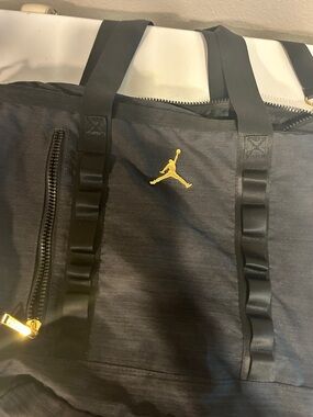 Jordan Black Duffel Bag with Gold Jumpman Accent